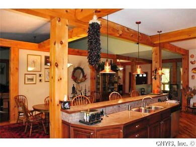Kitchen. Large snack bar with adjoining formal din