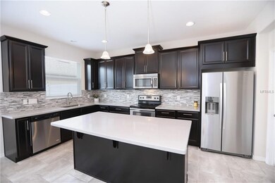 Kitchen with stainless steel appliances