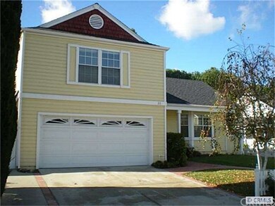 Large driveway and 2 car garage with storage