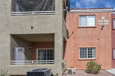 Back of house featuring central air condition unit