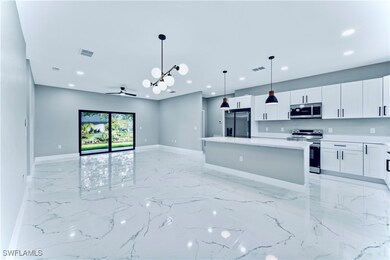 Kitchen featuring recessed lighting, stainless ste