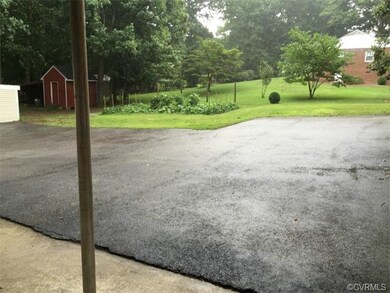 GARDEN AND STORAGE SHED, HUGE PAVED DRIVEWAY