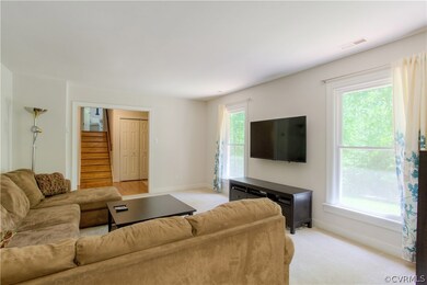ANOTHER VIEW OF THE FAMILY ROOM.