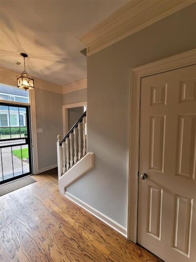 An opposing view of the foyer - living room to the