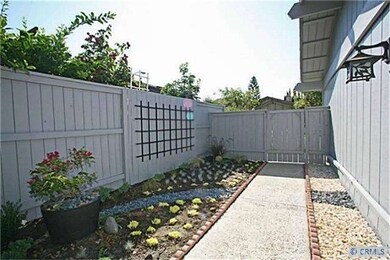 Cleanly landscaped and spacious side yard.