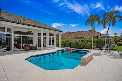 View of swimming pool featuring a patio, ceiling f