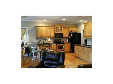BIG main floor laundry and utility room off of kit
