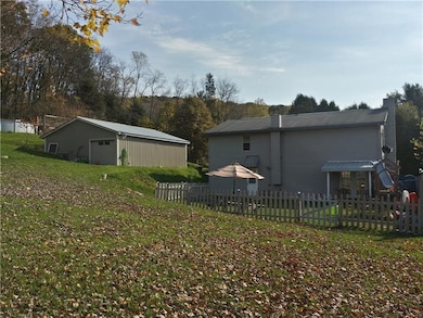 Front of house showing French doors off of living 