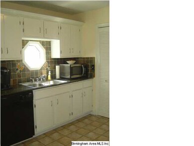 The Kitchen has been update with new tile-like vin