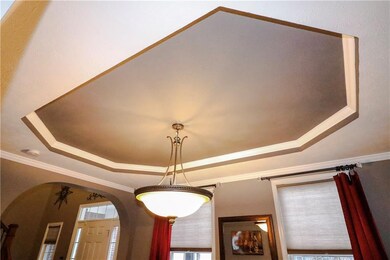 Close up of the unique tray ceiling feature, painted with such a warm and inviting color. 