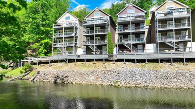 Rear view of property featuring a water view