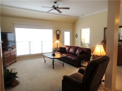 Plenty of Light, Fireplace with Gas Logs. Living Room is Big Enough for a Crowd--yet Cozy and Inviting.