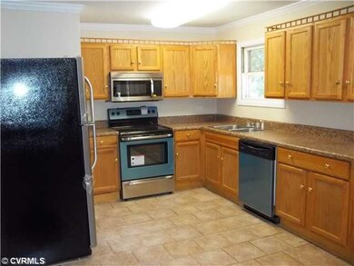 Kitchen - Large eat-in kitchen with new stainless steel appliances.