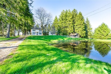 View from the end of the drive. Pond to the right
