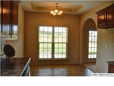 Generous sized eating area just off Kitchen