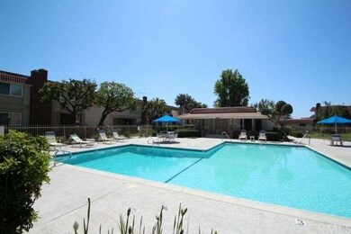 One of four sparkling swimming pools and club hous