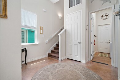 Entry, laundry room, and stairs