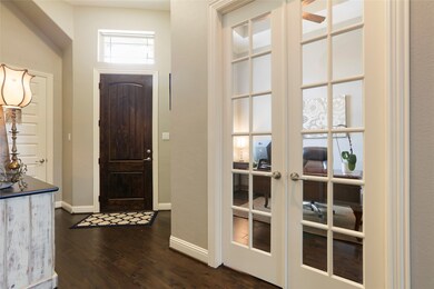 As you enter the home you are greeted with beautiful hardwood floors that continue thru all of the downstairs living spaces. The French Doors add the extra privacy for the owner who wants to work from home.