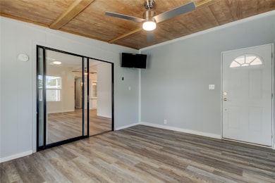 Front sunroom and door to covered front porch