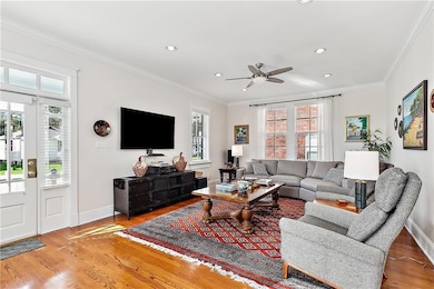 This large living room with beautiful wood floors