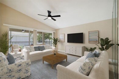 Living room with high vaulted ceiling, ceiling fan