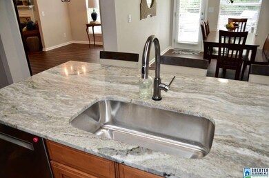 Just touch the faucet anywhere and it will turn or