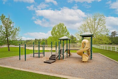 The common area includes a playground.