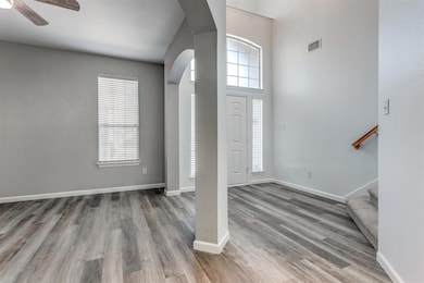 This view shows the entry and dining room.