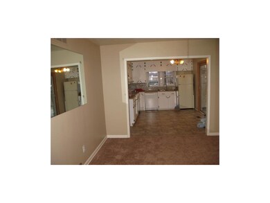 New carpet in front room, new vinyl in kitchen.
