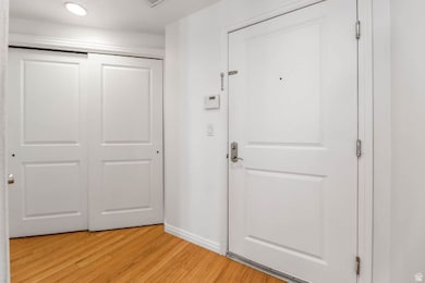 Doorway to outside featuring wood finished floors