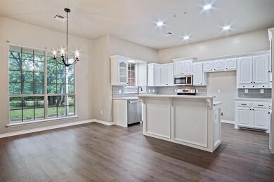 Kitchen featuring appliances with stainless steel 