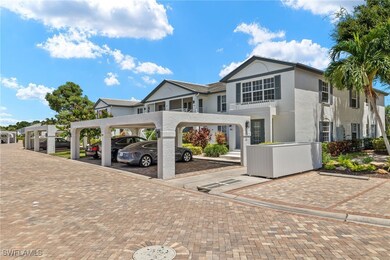 View of front of home with a carport