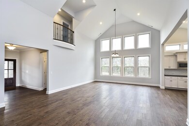 Hargrove- 2 story great room with windows. Photo for representation purposes only. 