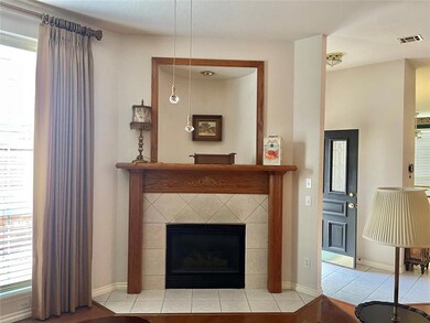 Corner tiled fireplace saves space
