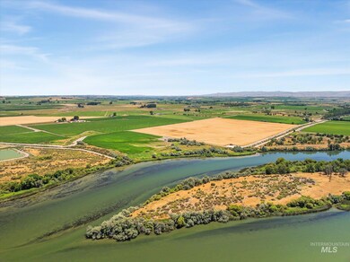 Aerial view of sparsely populated area with a nearby body of water