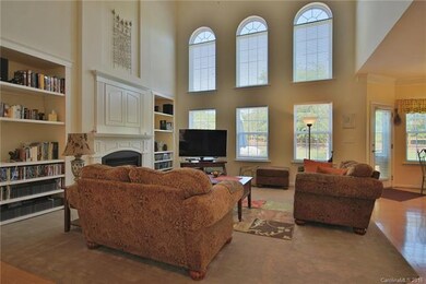 Two story great room with beautiful fire place, op