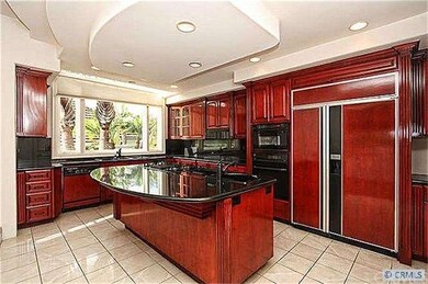 Kitchen with Sub Zero fridge and an abundance of c