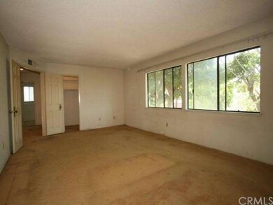 This is only part of the huge master bedroom.  Bri