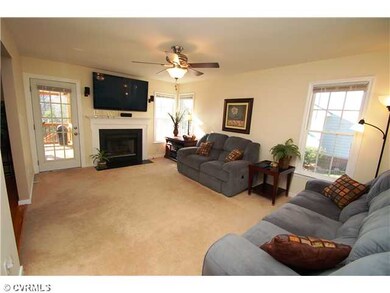 Living Room - Spacious living room with fireplace.