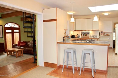 Foyer into Kitchen and Family Room