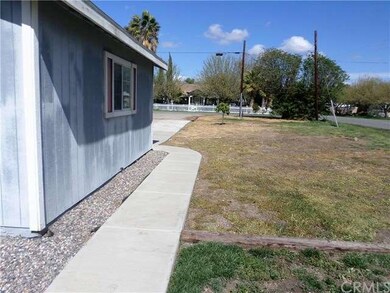 Part of Front Yard and Side of Garage