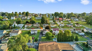 Aerial View of Neighborhood Pointing to Rear of Pr