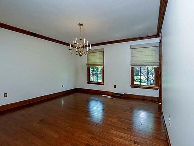 Dining Room. Dining room with gleaming hardwood floors, crown moldings