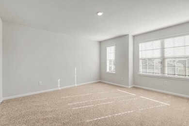 The expansive, primary bedroom is the perfect plac