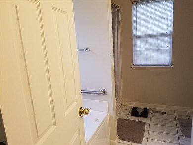 Master bedroom suite with handicap access and sepa