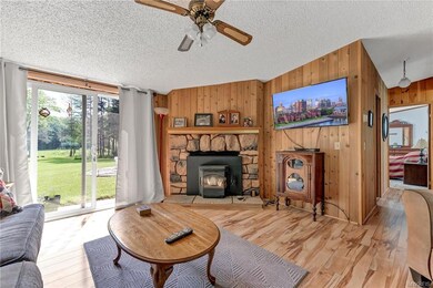 1 of 2 Living rooms complete with pellett stove.