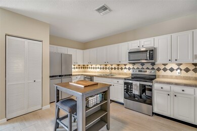 Large Open Kitchen with tile flooring, new refrige