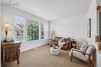Sitting room with natural light and views of rocks