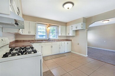 open kitchen with tons of cabinets