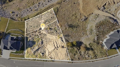 Aerial view of property and surrounding area with property boundaries highlighted